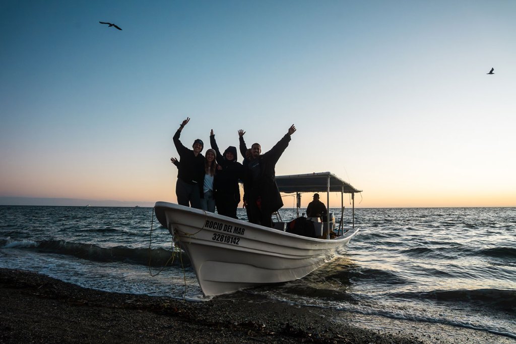 Small group aboard a boat during a Mind the Seas expedition in Magdalena Bay